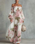 Witte maxi-jurk van chiffon met roze rozenprint en blote schouders