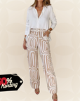 Christien – Losvallende broek met grafisch patroon