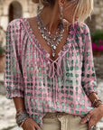 Lena | Blouse met stippenpatroon en vetersluiting