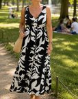 Regina - Mouwloze Midi Jurk met V-Hals Elastische Taille