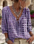 Lena | Blouse met stippenpatroon en vetersluiting