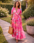 Ione | Mouwloze midi-jurk met bloemen en V-hals