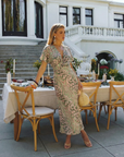 Coralie | Abstracte print Midi-jurk met V-hals en getailleerde taille
