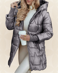 Noor – Glanzende winterjas met capuchon
