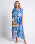 Calista | Maxi jurk van transparant materiaal met V-hals en gestrikte taille
