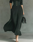 Leona - Lange geplooide jurk met revers en hoge taille