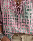 Lena | Blouse met stippenpatroon en vetersluiting