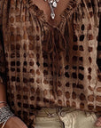 Lena | Blouse met stippenpatroon en vetersluiting