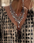 Lena | Blouse met stippenpatroon en vetersluiting