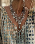 Lena | Blouse met stippenpatroon en vetersluiting