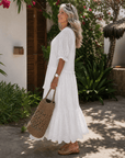 Elkaline | Eyelet Lace Tiered V-hals Midi-jurk