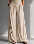 Feline | Elegante beige overslag jumpsuit