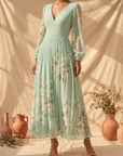 Cisella | Midi jurk lichtgroen met bloemen