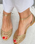 Isadora | Gouden gevlochten sandalen