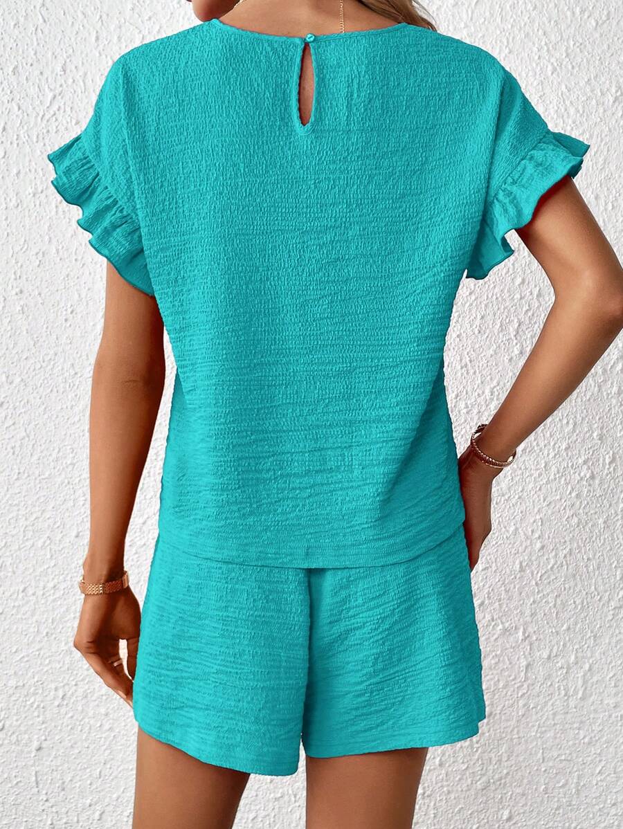 Britt | Casual set met rimpeling en knoopdetails