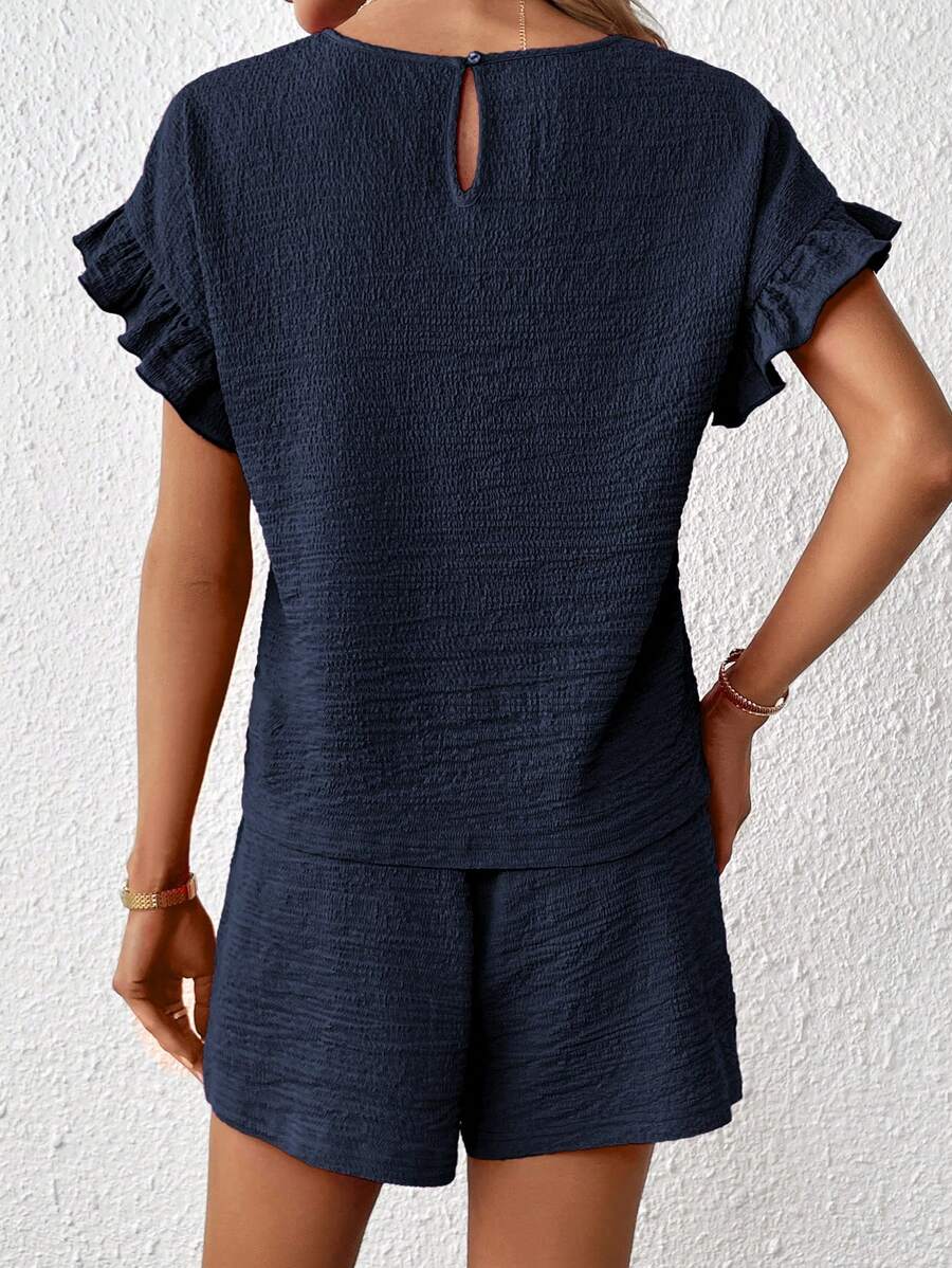 Britt | Casual set met rimpeling en knoopdetails