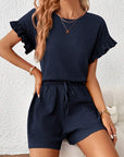 Britt | Casual set met rimpeling en knoopdetails