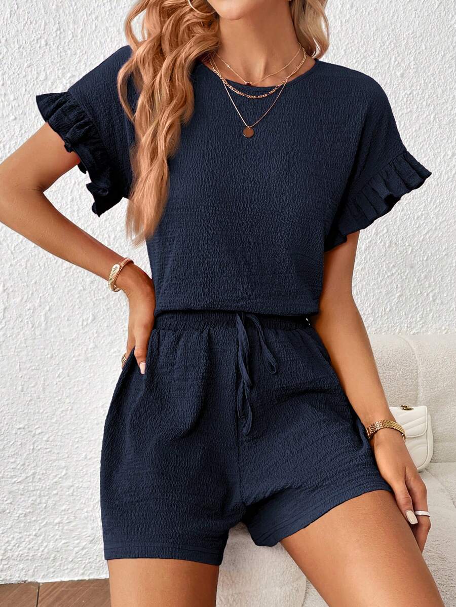 Britt | Casual set met rimpeling en knoopdetails