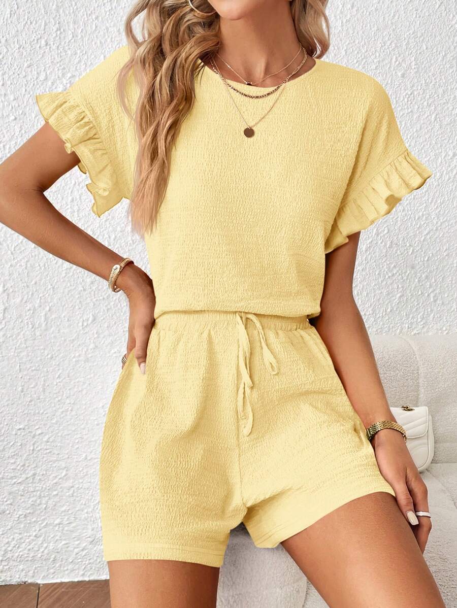 Britt | Casual set met rimpeling en knoopdetails