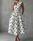 Zwart-witte klassieke polka dot Franse mouwloze midi-jurk