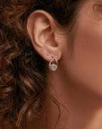 Oorbellen met gouden kruis en zirconia
