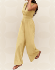 Marga | Effen jumpsuit met diepe V-hals en gerimpelde mouwen
