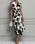 Zwarte Vlek Print V-Hals Midi Jurk met Gecinchde Taille