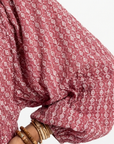 Arlette | Midi-jurk met geometrische print en lange mouwen