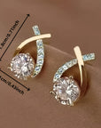 Oorbellen met gouden kruis en zirconia