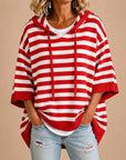 Meta | Gestreepte gebreide poncho met capuchon