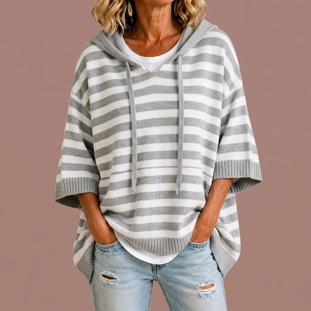 Meta | Gestreepte gebreide poncho met capuchon