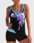 Flor – Bloemige tankini met short, effect platte buik