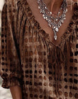 Lena | Blouse met stippenpatroon en vetersluiting