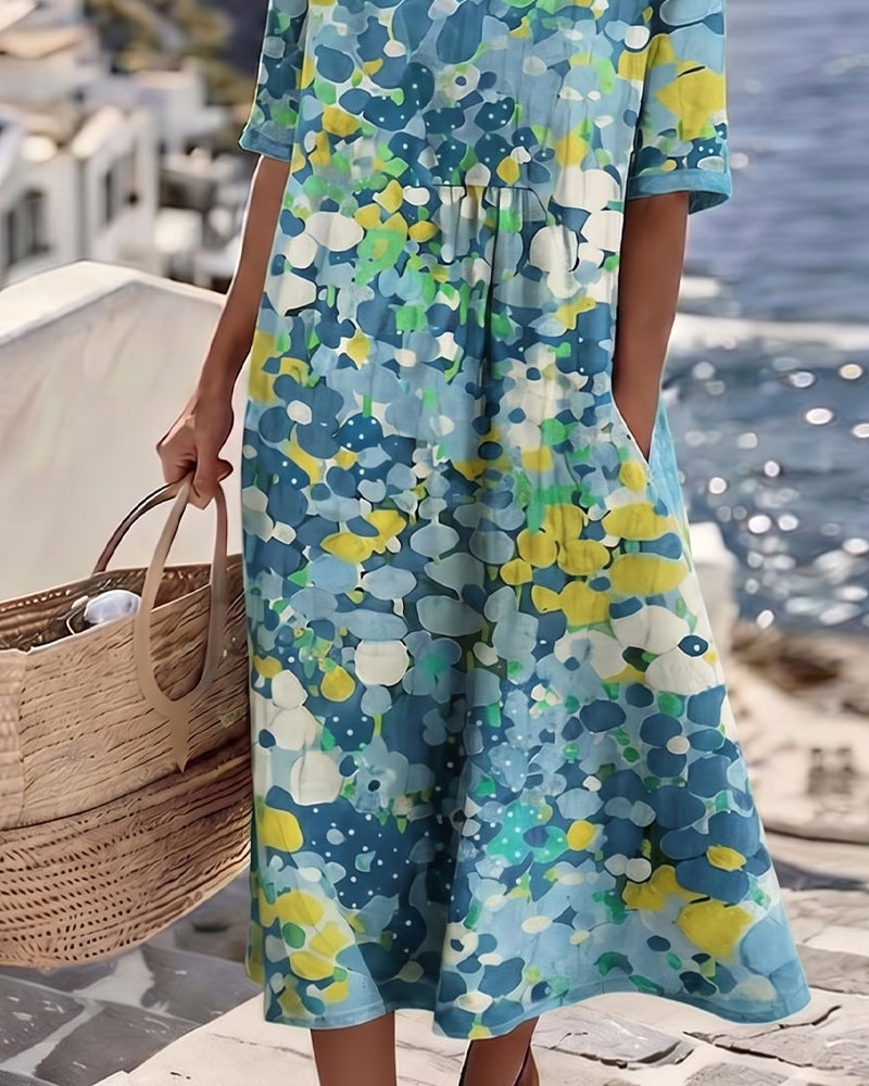 Ilse | Lichte, losse midi-jurk met bloemenprint