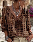 Lena | Blouse met stippenpatroon en vetersluiting