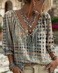 Lena | Blouse met stippenpatroon en vetersluiting