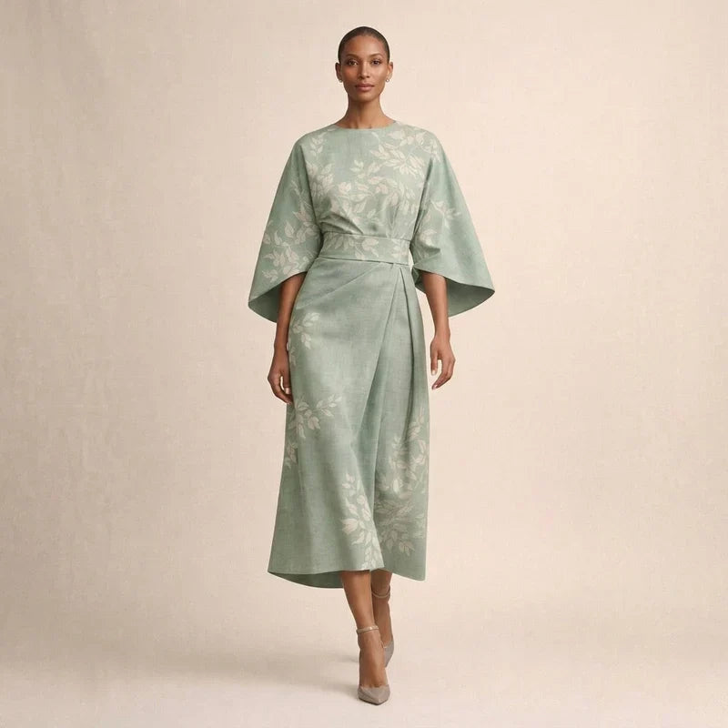 CLEMENTINE | Florale Midi met sculptuur taille en luchtige elegantie