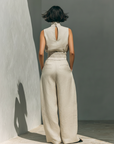 Marieta | Minimalistische set van mouwloze blouse en wijde broek