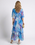 Calista | Maxi jurk van transparant materiaal met V-hals en gestrikte taille