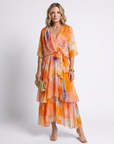 Calista | Maxi jurk van transparant materiaal met V-hals en gestrikte taille