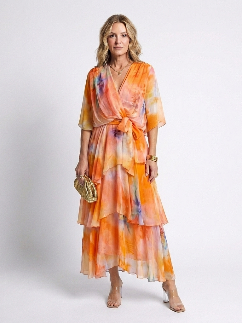 Calista | Maxi jurk van transparant materiaal met V-hals en gestrikte taille