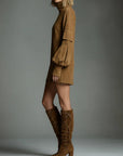 Manon - Losse minijurk van suede met hoge hals