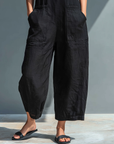 Lotty -- Mouwloze minimalistische jumpsuit