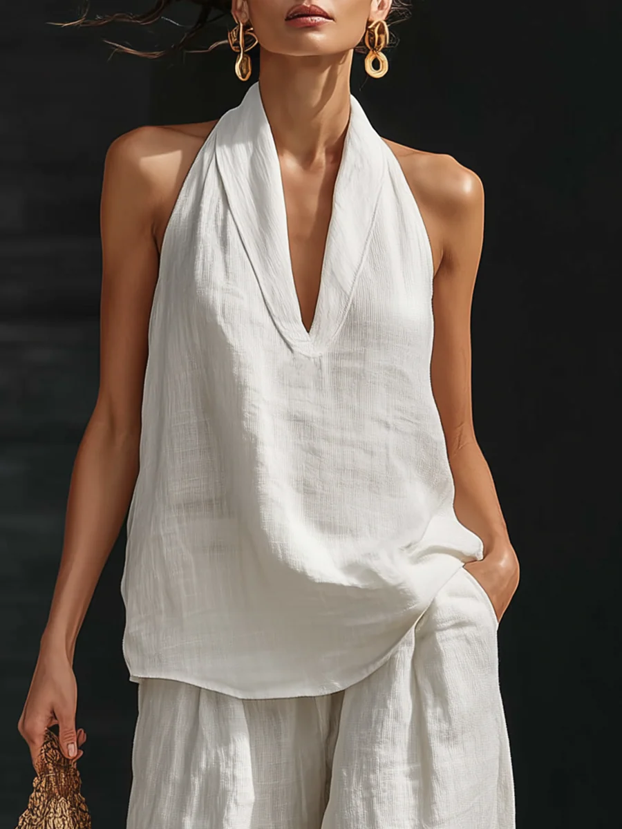 Zoë™ – Mouwloos ensemble en brede broek