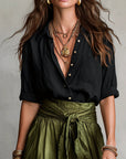 Vera – Set van twee delen: zwarte blouse en olijfgroene midi-rok