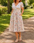 Dionne - Damesjurk met V-hals, bloemenprint en gedraaide taille