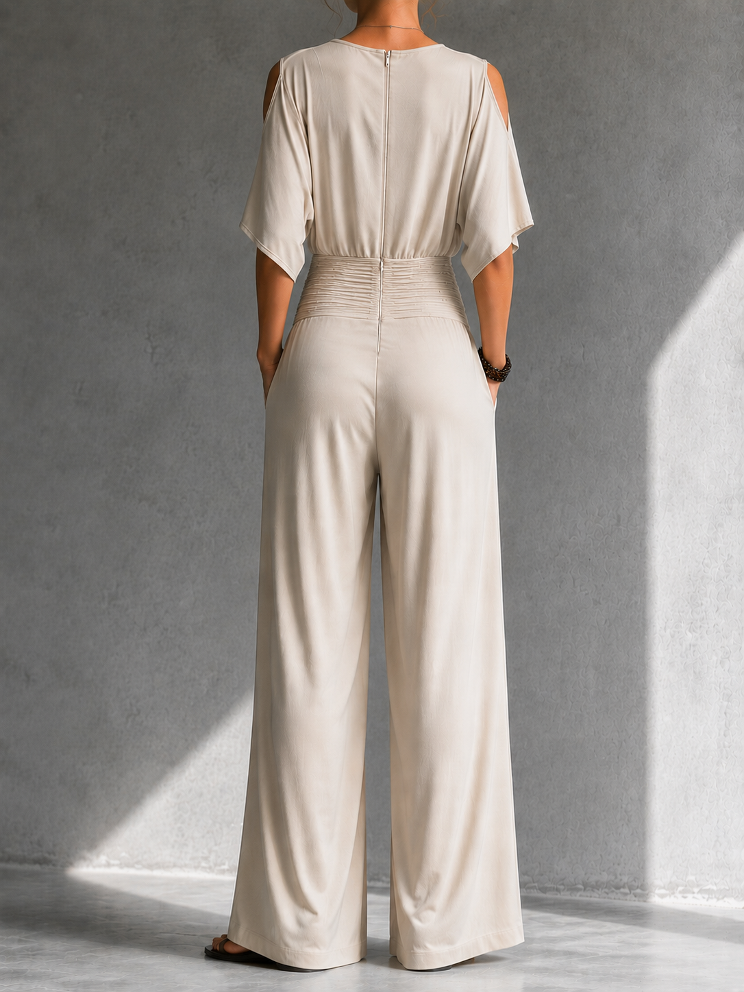 Feline | Elegante beige overslag jumpsuit