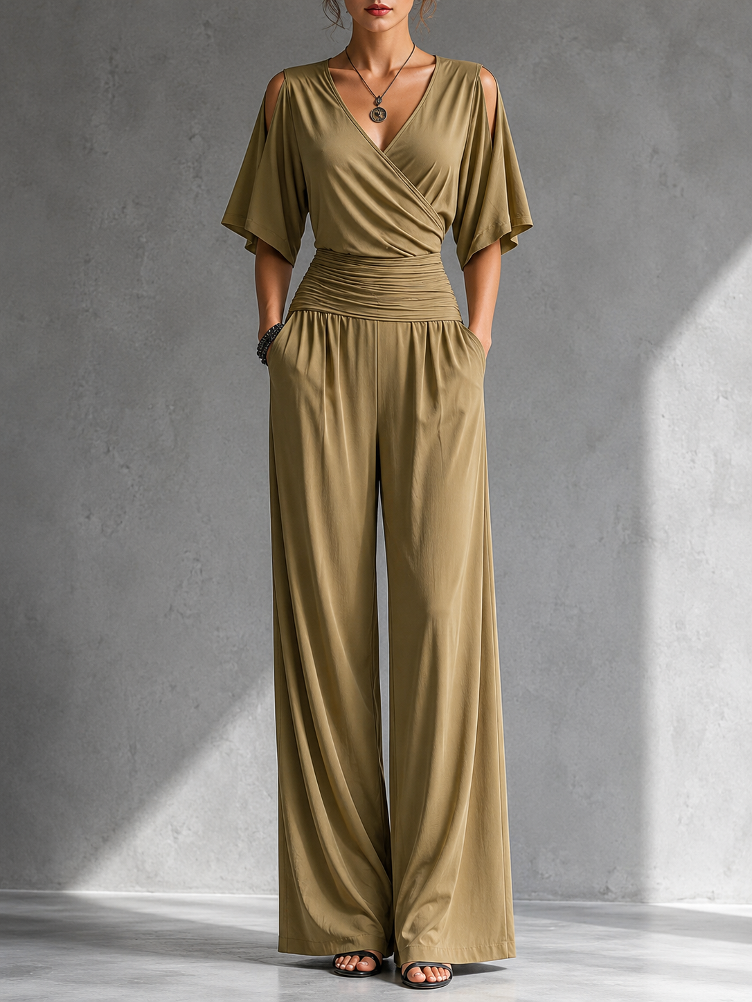 Feline | Elegante beige overslag jumpsuit