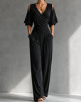 Feline | Elegante beige overslag jumpsuit