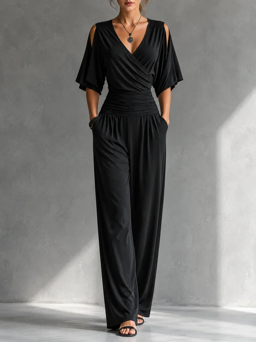 Feline | Elegante beige overslag jumpsuit